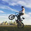 Image of Joulvert Mercer - Folding Electric Bike - Popping a wheelie