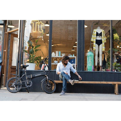 Joulvert Stealth - Folding Electric Bike - In front of a store