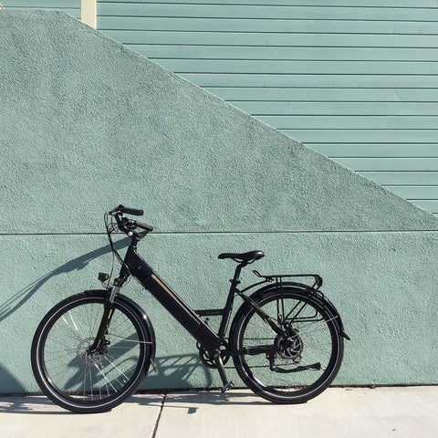 Black Espin Flow - Electric Commuter Bike - Leaning against a wall