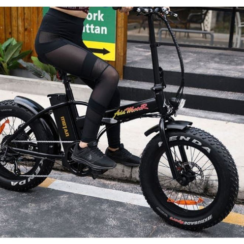 Black AddMotor Motan M150 - Folding Fat Tire Electric Bike - Riding Down Street