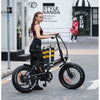 Image of Black AddMotor Motan M150 - Folding Fat Tire Electric Bike - with Female Rider in Street