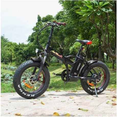 Black AddMotor Motan M150 P7 - Folding Fat Tire Electric Bike - On Sidewalk