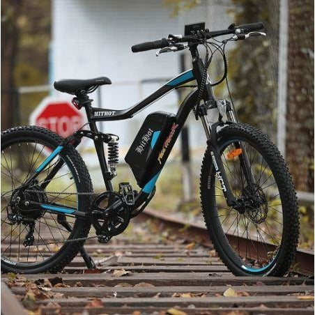 Blue AddMotor HitHot H1 - Electric Mountain Bike - on train tracks