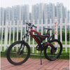 Image of Red AddMotor HitHot H5 - Electric Mountain Bike - In Front of Fence 