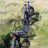 Image of Rambo Bikes - Single Wheeled Cart - Attached to E-Bike in a field 