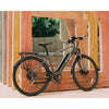 Image of Grey e-Joe KODA Sports Class - Electric Commuter Bike - Leaning against wood panels 